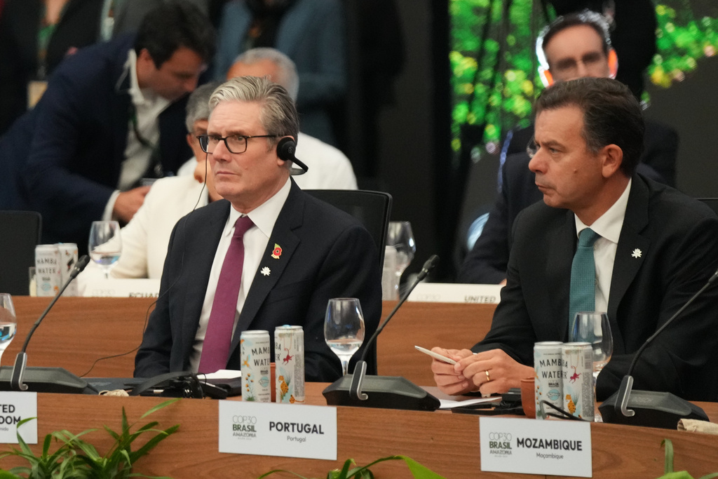Britain Prime Minister Keir Starmer, left, and Portugal Prime Minister Luis Montenegro attend a roundtable with leaders of tropical forest countries and nations committed to investing in the Tropical Forest Forever Facility (TFFF) during the COP30 U.N. Climate Summit in Belem, Brazil, Thursday, Nov. 6, 2025. (AP Photo/Fernando Llano)