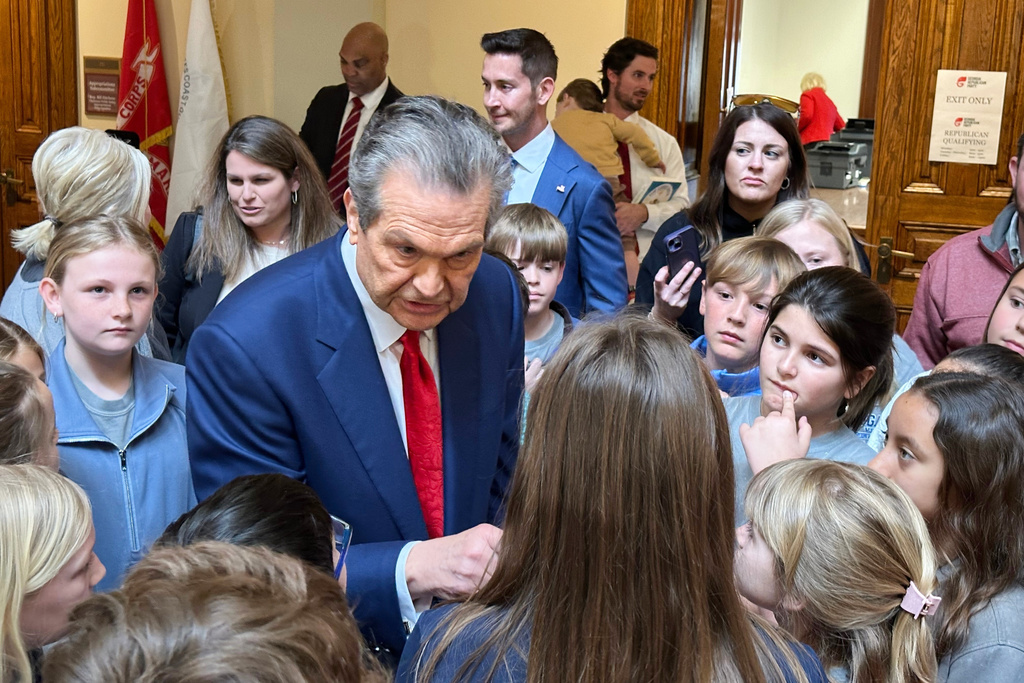 Republican Rick Jackson speaks to schoolchildren after qualifying to run for governor on Friday, March 6, 2026, at the Georgia Capitol in Atlanta (AP Photo/Jeff Amy)