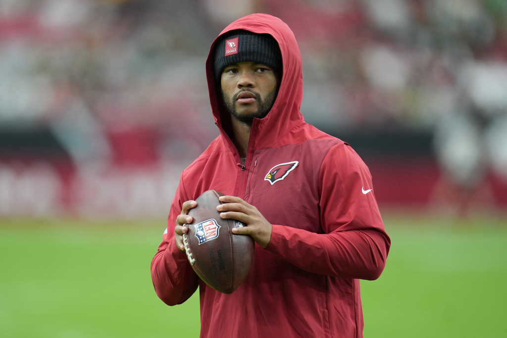 FILE - Arizona Cardinals quarterback Kyler Murray (1) warms up against the Green Bay Packers during an NFL football game Oct. 19, 2025, in Glendale, Ariz. (AP Photo/Rick Scuteri, File)