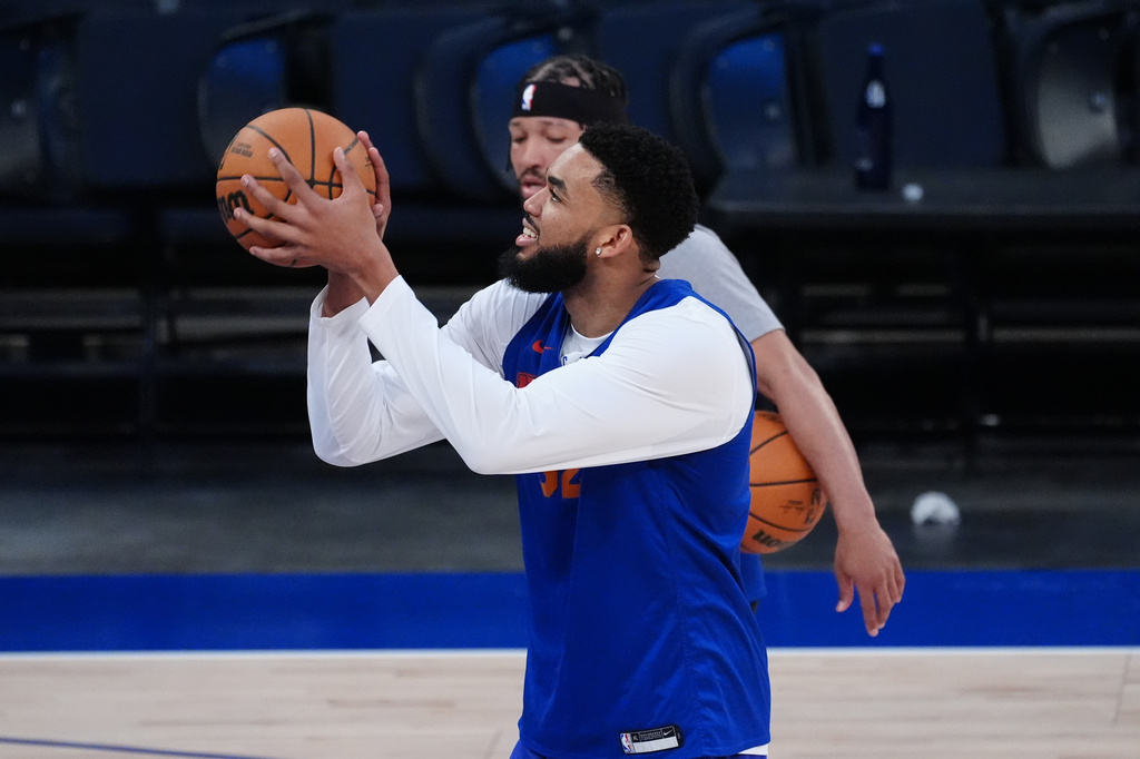New York Knicks center Karl-Anthony Towns runs drills prior to Game 3 of the NBA Finals basketball series against the San Antonio Spurs, Sunday, June 7, 2026, in New York. (AP Photo/Ross D. Franklin)