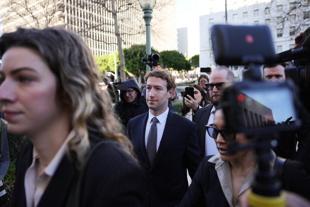 Meta CEO Mark Zuckerberg arrives for a landmark trial over whether social media platforms deliberately addict and harm children, Wednesday, Feb. 18, 2026, in Los Angeles. (AP Photo/Ryan Sun)