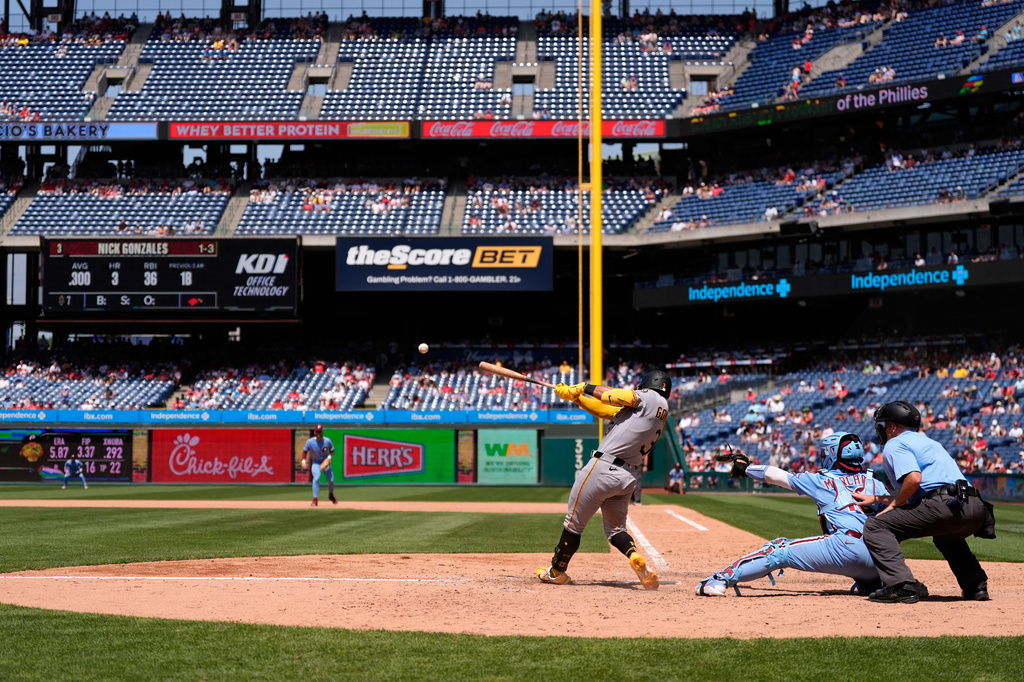 Pittsburgh Pirates' Nick Gonzales hits a run-scoring single against Philadelphia Phillies pitcher José Alvarado during the seventh inning of a baseball game Thursday, July 2, 2026, in Philadelphia. (AP Photo/Matt Slocum)