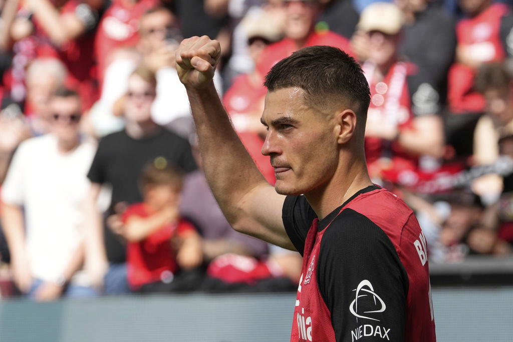 FILE - Leverkusen's Patrik Schick celebrates after scoring his side's opening goal during the German Bundesliga soccer match between Bayer Leverkusen and FC Augsburg at the BayArena in Leverkusen, Germany, on, April 26, 2025. (AP Photo/Martin Meissner/File)