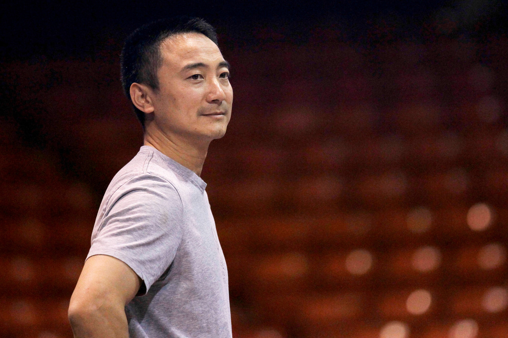 *HOLD FOR STORY * FILE - Gymnastics coach Liang "Chow" Qiao is seen during a practice session for the US Classic gymnastics meet, May 25, 2012, in Chicago. (AP Photo/Charles Rex Arbogast, File)