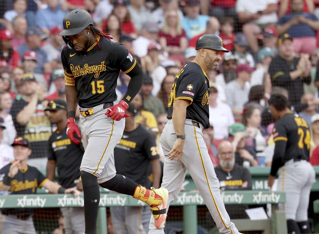 Pittsburgh Pirates' Oneil Cruz (15) runs to the plate after hitting a home run during the sixth inning of a baseball game against the Boston Red Sox, Saturday, Aug. 30, 2025, in Boston. (AP Photo/Mark Stockwell)