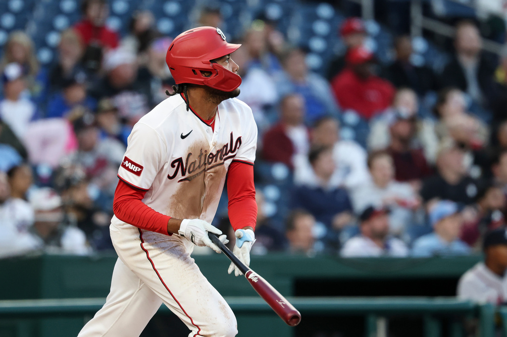 Washington Nationals' James Wood runs after hitting a solo home run against Atlanta Braves pitcher Reynaldo López during the second inning of a baseball game, Tuesday, April 21, 2026, in Washington. (AP Photo/Terrance Williams)