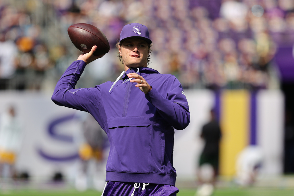 Minnesota Vikings quarterback J.J. McCarthy warms up before an NFL football game against the Green Bay Packers, Sunday, Sept. 13, 2026, in Minneapolis, Minn. (AP Photo/Bailey Hillesheim)