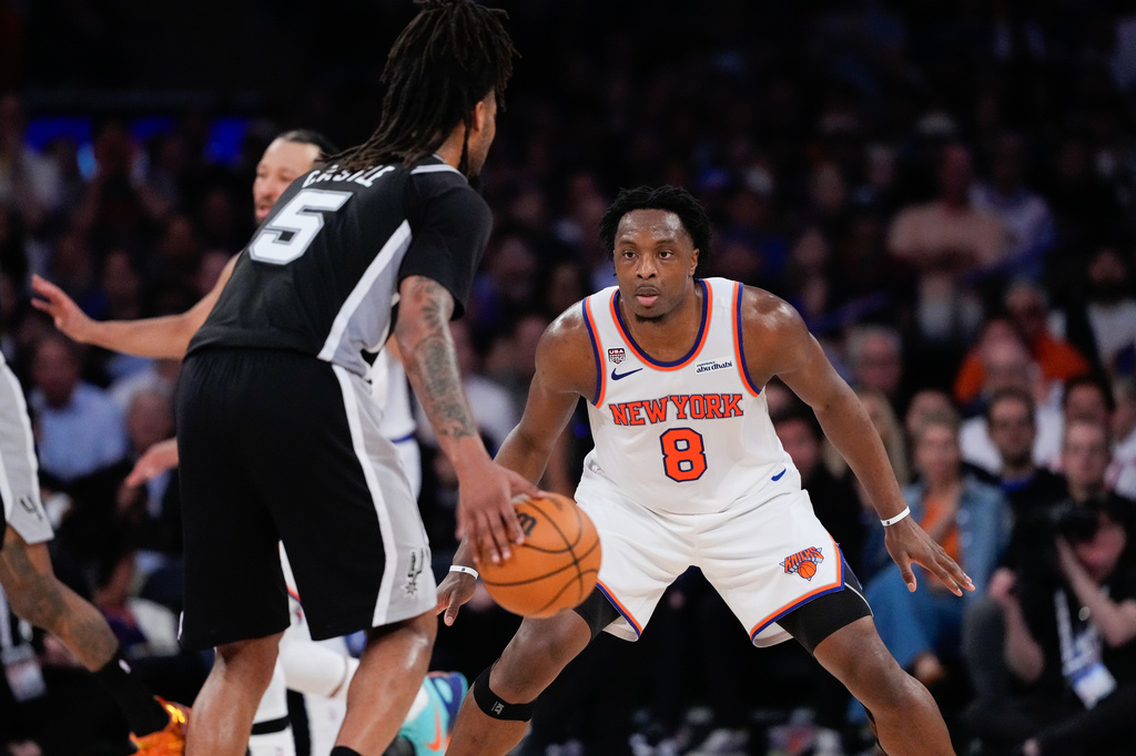 New York Knicks forward Og Anunoby (8) defends against San Antonio Spurs guard Stephon Castle during the first half of Game 3 of the NBA Finals basketball series, Monday, June 8, 2026, in New York. (AP Photo/Ross D. Franklin)