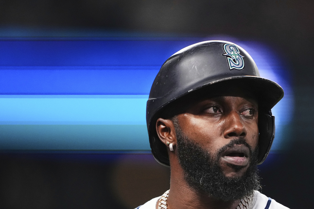 Seattle Mariners' Randy Arozarena looks on after hitting an RBI sacrifice fly to score designated hitter Mitch Garver against the St. Louis Cardinals during the fourth inning of a baseball game Tuesday, Sept. 9, 2025, in Seattle. (AP Photo/Lindsey Wasson)