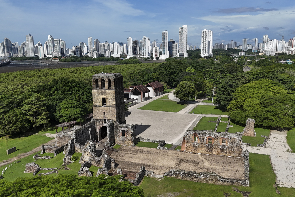 Ruins of the old bell tower in "Panama Viejo," or Old Panama, the first permanent Spanish settlement on the Pacific coast of the Americas, is backdropped by the modern skyline of Panama City, Wednesday, July 30, 2025. (AP Photo/Matias Delacroix)