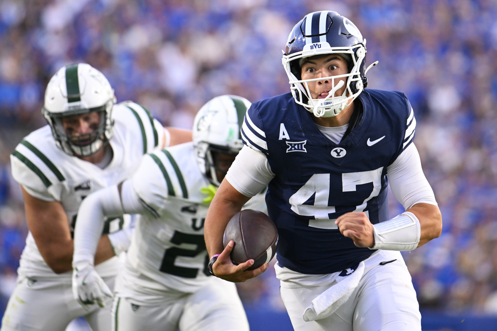 BYU Cougars quarterback Bear Bachmeier (47) runs into a touchdown during the first half of an NCAA college football game against Portland State, Saturday, Aug. 30, 2025 in Provo. (AP Photo/Alex Goodlett)
