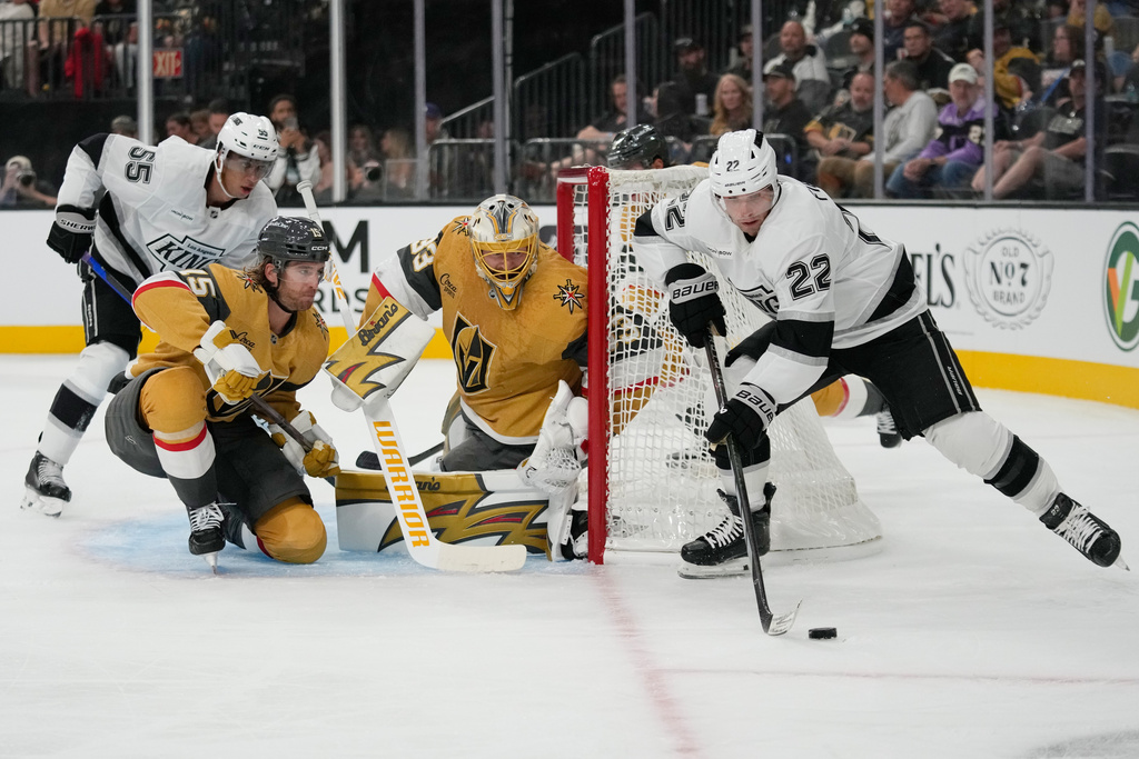 Los Angeles Kings left wing Kevin Fiala (22) looks to pass against the Vegas Golden Knights during the first period of an NHL hockey game Wednesday, Oct. 8, 2025, in Las Vegas. (AP Photo/John Locher)