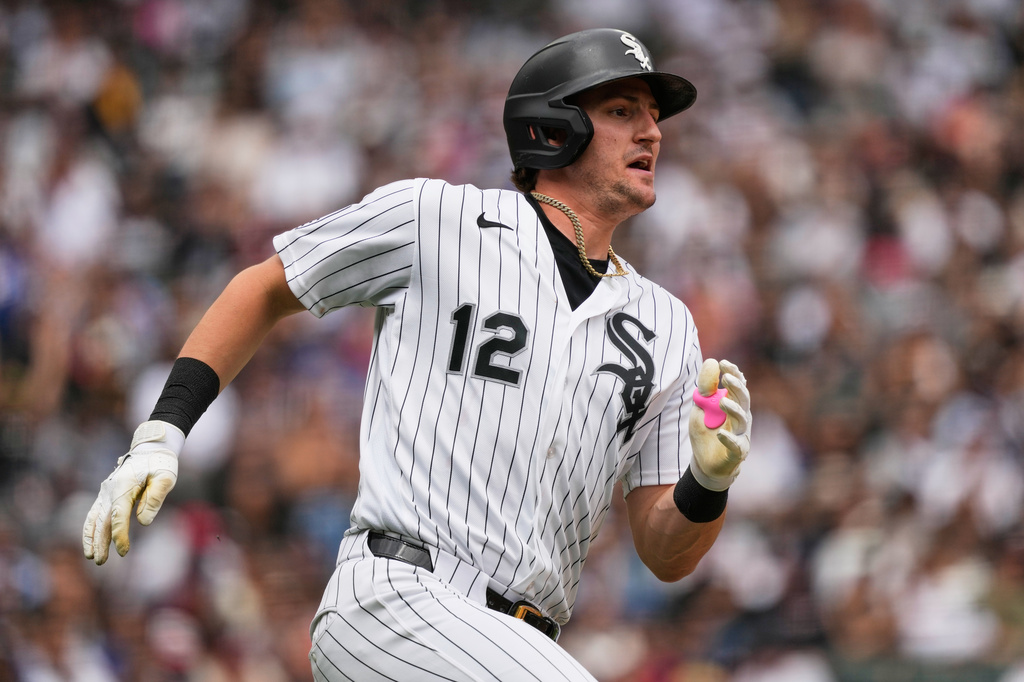 Chicago White Sox's Colson Montgomery runs after hitting a double during the fourth inning of a baseball game against the Los Angeles Dodgers in Chicago, Sunday, June 14, 2026. (AP Photo/Nam Y. Huh)