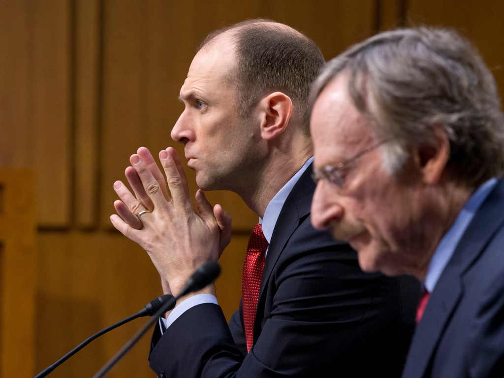 FILE - Austan Goolsbee, left, then-Council of Economic Advisers Chairman under President Barack Obama, testifies on Capitol Hill in Washingto, Feb. 28, 2013. (AP Photo/J. Scott Applewhite, File)
