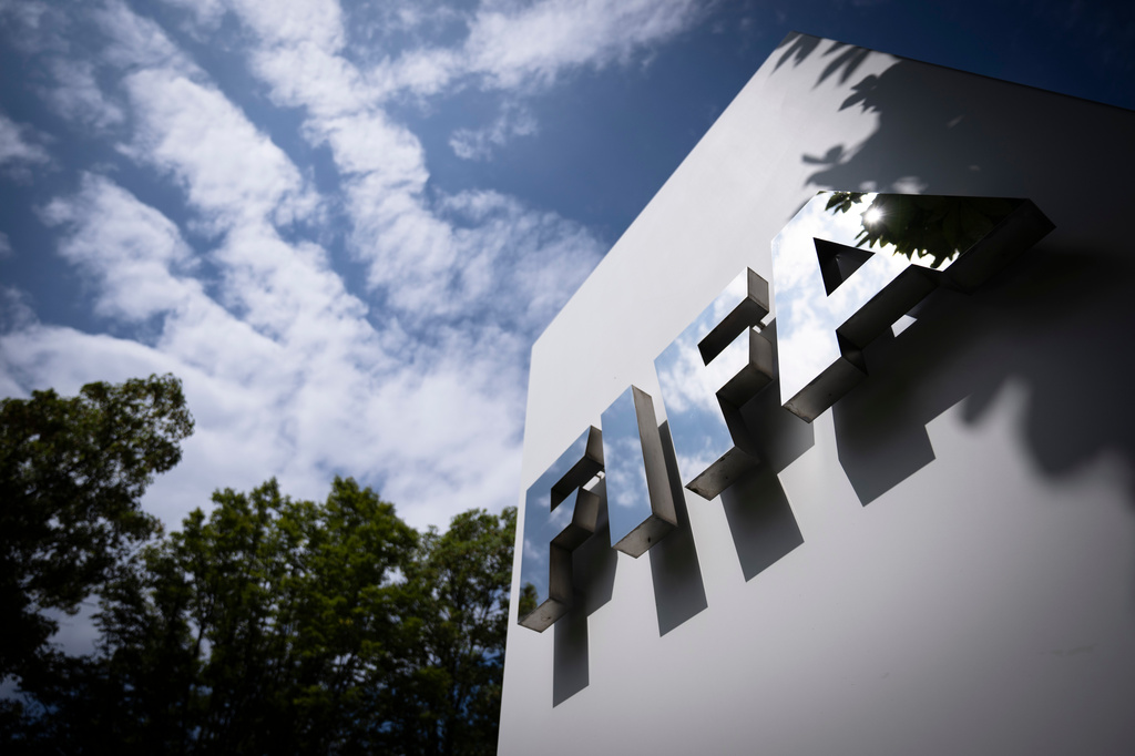 FILE - The FIFA logo is seen at the entrance of FIFA headquarters in Zurich, Switzerland, Aug. 6, 2026. (Andreas Becker/Keystone via AP, File)