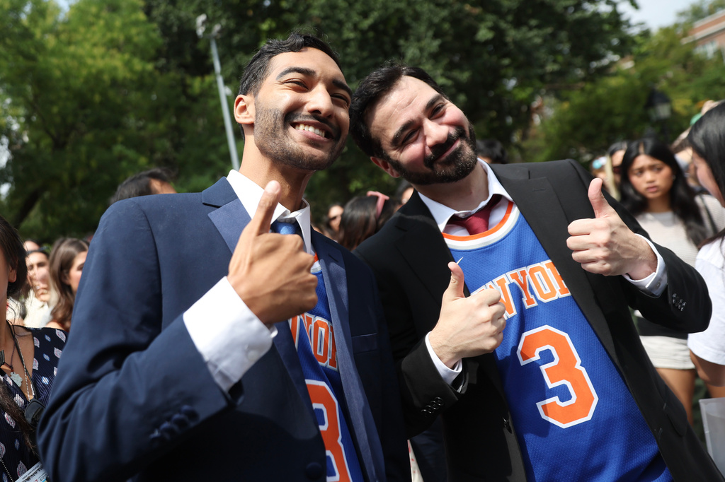 Participants pose for photos during a Zohran Mamdani look-alike contest, Sunday, Aug. 30, 2026, in New York. (AP Photo/Heather Khalifa)