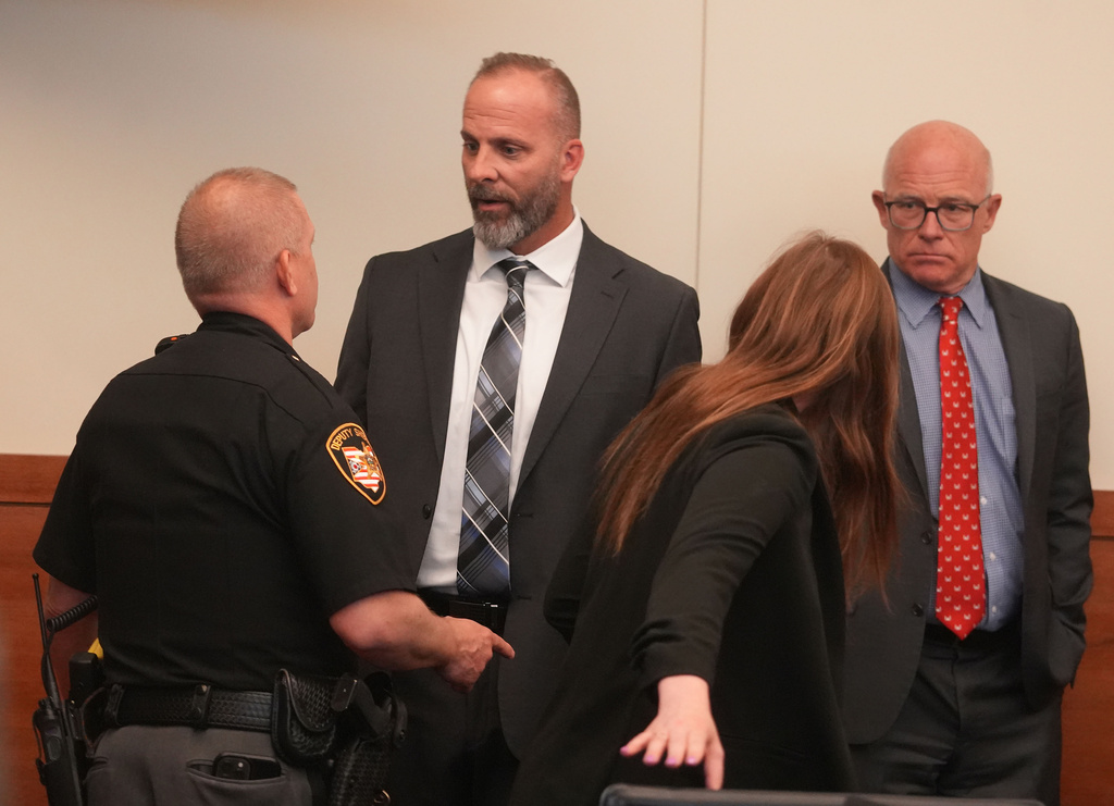 Former sheriff's deputy Jason Meade, second from left, speaks to law enforcement after he was found guilty of reckless homicide Thursday, May 7, 2026, in Columbus, Ohio, in the shooting death of Casey Goodson Jr. (Doral Chenoweth/The Columbus Dispatch via AP, Pool)