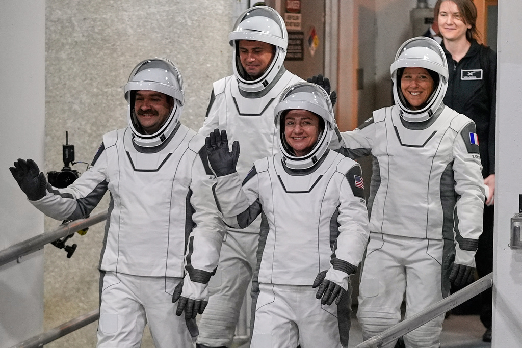 Crew 12 mission astronauts, from left, pilot Jack Hathaway, Russian cosmonaut Andrei Fedyaev, commander Jessica Meir and ESA astronaut Sophia Adenot, of France, leave the Operations and Checkout building before heading to pad 40 at the Cape Canaveral Space Force Station in Cape Canaveral, Fla., Friday, Feb. 13, 2026, on a mission to the International Space Station. (AP Photo/John Raoux)