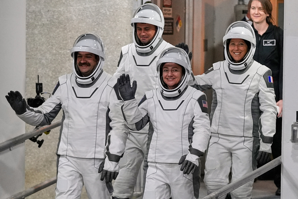 Crew 12 mission astronauts, from left, pilot Jack Hathaway, Russian cosmonaut Andrei Fedyaev, commander Jessica Meir and ESA astronaut Sophia Adenot, of France, leave the Operations and Checkout building before heading to pad 40 at the Cape Canaveral Space Force Station in Cape Canaveral, Fla., Friday, Feb. 13, 2026, on a mission to the International Space Station. (AP Photo/John Raoux)