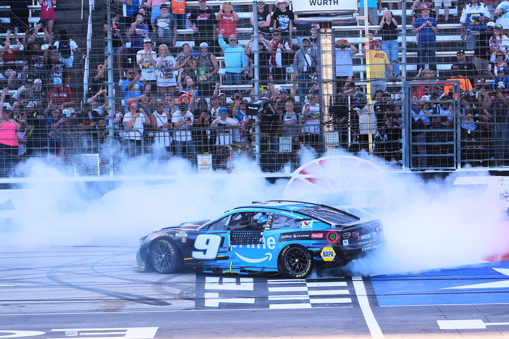 Chase Elliott does a burnout at the finish line after winning a NASCAR Cup Series auto race in Fort Worth, Texas, Sunday, May 3, 2026. (AP Photo/LM Otero)