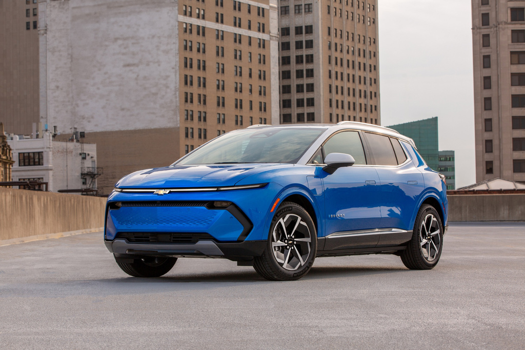 This photo provided by Chevrolet shows the 2024 Equinox EV, a small yet surprisingly roomy electric SUV that offers up to 319 miles of range. As a used EV, it can be a compelling value. (Courtesy of General Motors via AP)