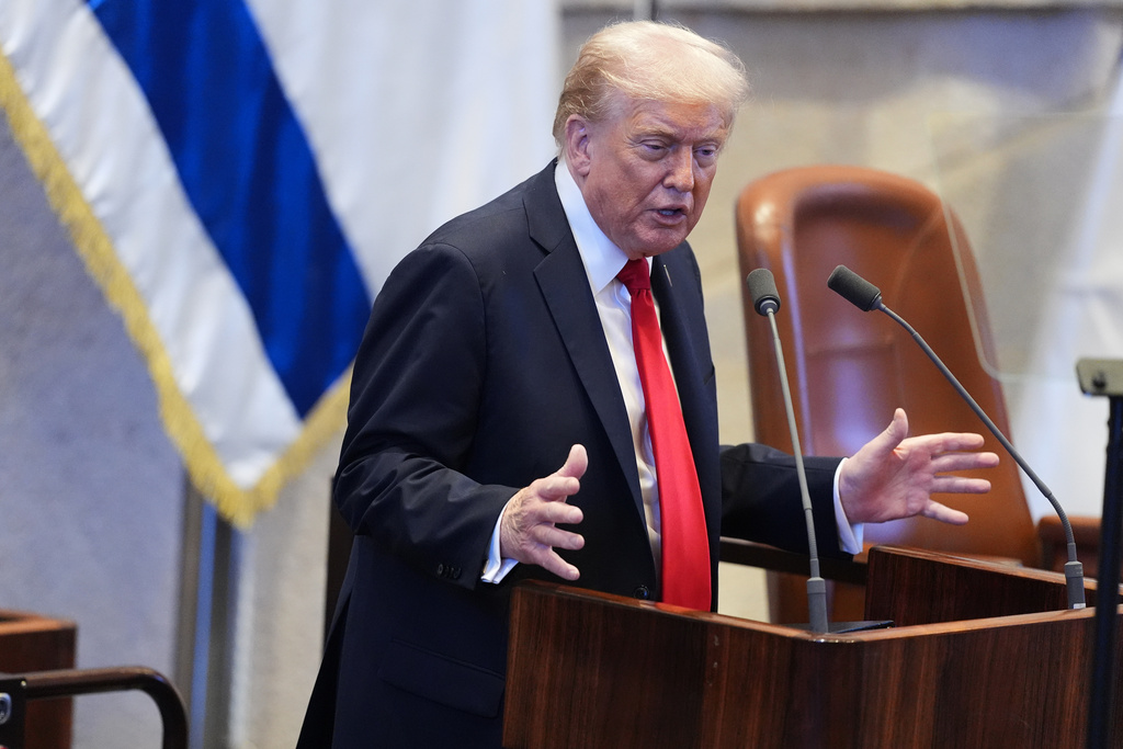 President Donald Trump speaks to the Knesset, Israel's parliament, Monday, Oct. 13, 2025, in Jerusalem. (AP Photo/Evan Vucci, Pool)