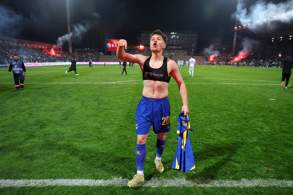Bosnia's Esmir Bajraktarevic celebrates after winning a penalty shootout during the World Cup qualifying playoff final soccer match between Bosnia and Italy in Zenica, Bosnia, Tuesday, March 31, 2026. (AP Photo/Armin Durgut)