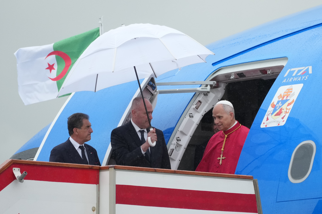 Pope Leo XIV arrives at Algiers' Houari Boumédiène International Airport on Monday, April 13, 2026, at the start of an 11-day apostolic journey to Africa. (AP Photo/Andrew Medichini)