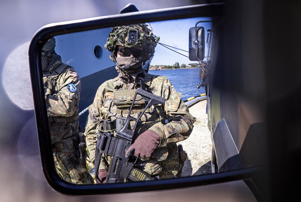 Soldiers of the German forces, Bundeswehr, during the Media Day as part of the 'Quadriga 2025' military maneuver in Rostock, Germany, Thursday, Sept. 4, 2025. (Jens Buettner/dpa via AP)