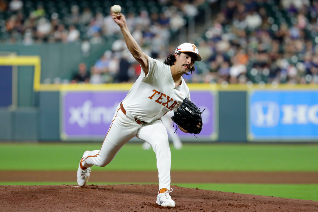 FILE - Texas starting pitcher Ruger Riojas throws against Coastal Carolina during an NCAA baseball game on Feb. 27, 2026, in Houston. (AP Photo/Michael Wyke).