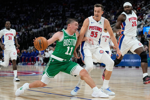 Boston Celtics guard Payton Pritchard (11) drives against Detroit Pistons forward Duncan Robinson (55) during the first half of an NBA basketball game Sunday, Oct. 26, 2025, in Detroit. (AP Photo/Ryan Sun) Boston Celtics guard Payton Pritchard (11) drives against Detroit Pistons forward Duncan Robinson (55) during the first half of an NBA basketball game Sunday, Oct. 26, 2025, in Detroit. (AP Photo/Ryan Sun)