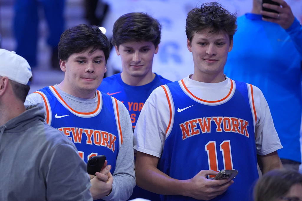 New York Knicks' fans watch warm-ups before Game 3 in a second-round NBA basketball playoff series against the Philadelphia 76ers Friday, May 8, 2026, in Philadelphia. (AP Photo/Matt Slocum)