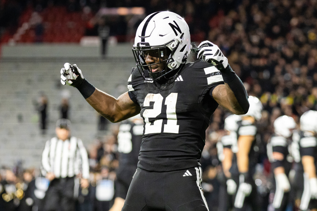 Nebraska running back Emmett Johnson (21) celebrates a touchdown against Southern California during the first half of an NCAA college football game Saturday, Nov. 1, 2025, in Lincoln, Neb. (AP Photo/Bonnie Ryan)