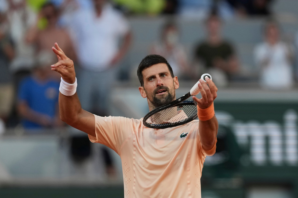 Novak Djokovic of Serbia celebrates after winning against Valentin Royer of France during their second round men's singles tennis match at the French Open tennis tournament in Paris, Wednesday, May 27, 2026. (AP Photo/Thibault Camus)