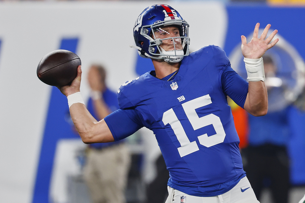 New York Giants quarterback Tommy DeVito (15) passes against the New York Jets during the fourth quarter of an NFL football game, Saturday, Aug. 16, 2025, in East Rutherford, N.J. (AP Photo/Noah K. Murray)