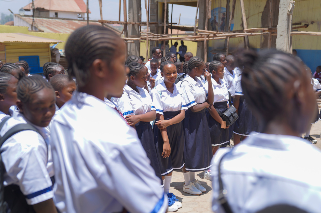 Students attend a school assembly on the first day of the new school year amid the Ebola virus outbreak, in Ituri, Congo, Tuesday, Sept.1, 2026. (AP Photo/Dieudonne Dirole)