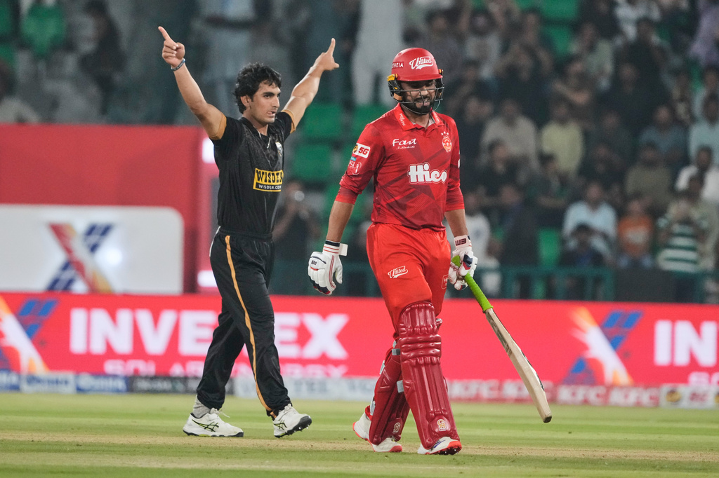 Hyderabad Kingsmen Hunain Shah, left, celebrates after taken the wicket of Islamabad United Faheem Ashraf, right, during the Pakistan Super League second eliminator cricket match between Hyderabad Kingsmen and Islamabad United, in Lahore, Pakistan, Friday, May 1, 2026. (AP Photo/K.M. Chaudary)