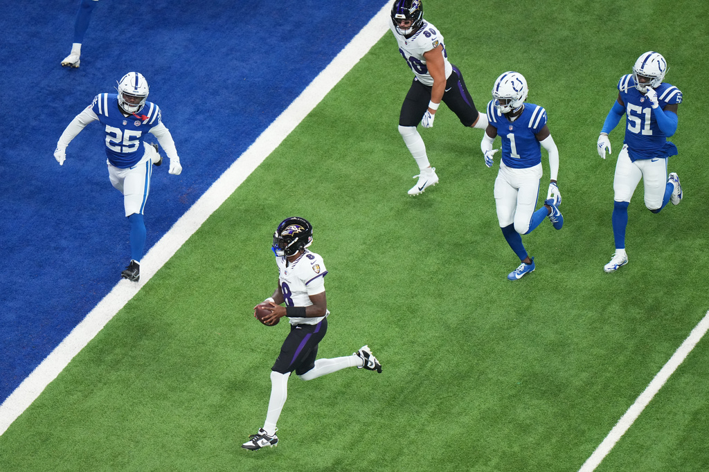 Baltimore Ravens' Lamar Jackson runs for a touchdown during the first half of an NFL football game against the Indianapolis Colts Sunday, Sept. 13, 2026, in Indianapolis. (AP Photo/AJ Mast)