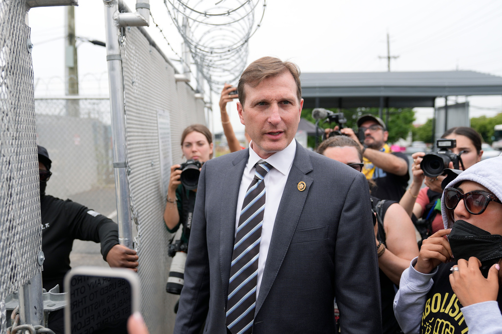 Rep. Dan Goldman, D-N.Y., gets ready to enter the Delaney Hall detention center as a protest against the transfer of detainees takes place on Wednesday, May 27, 2026, in Newark, N.J. (AP Photo/Seth Wenig)