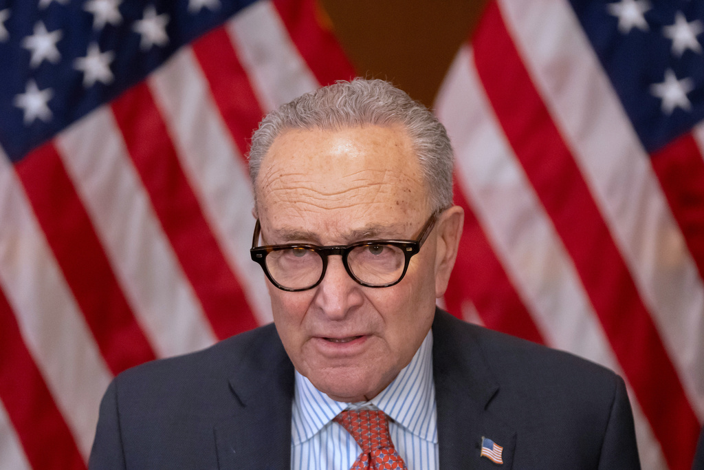 Senate Minority Leader Chuck Schumer, of N.Y., speaks to reporters on Capitol Hill, Wednesday, Dec. 3, 2025, in Washington. (AP Photo/Mark Schiefelbein)