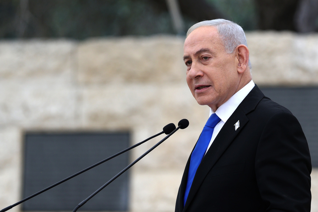 FILE - Israel's Prime Minister Benjamin Netanyahu attends a ceremony at the Military Cemetery on Mount Herzl in Jerusalem, April 21, 2026. (Ilia Yefimovich/Pool Photo via AP, File)