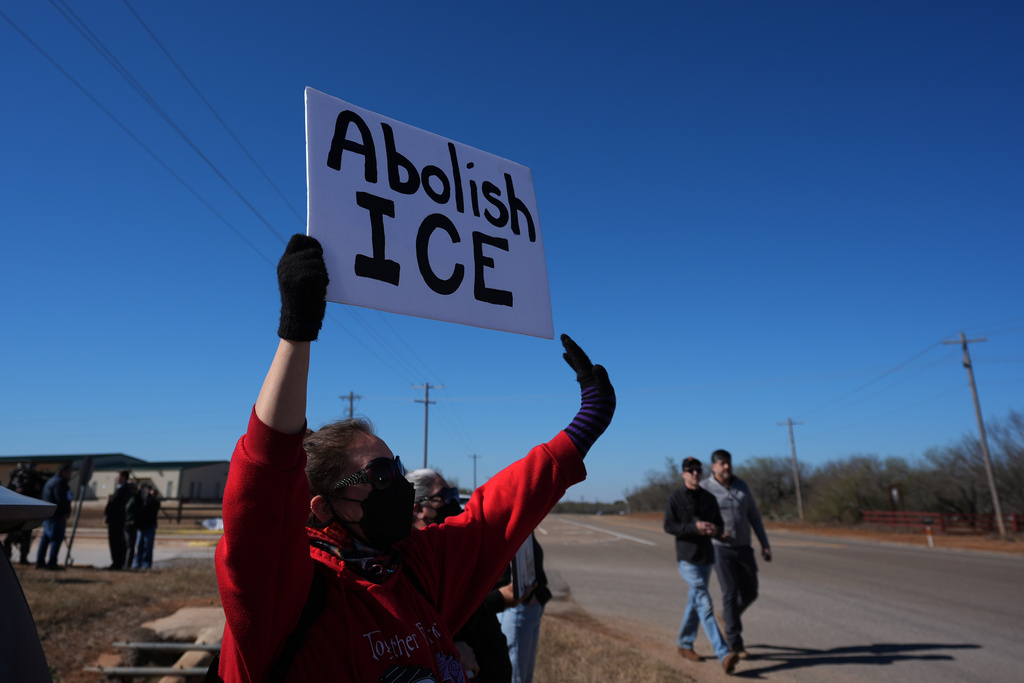 Protesters gather outside the South Texas Family Residential Center detention facility where Liam Ramos and his father are being detained in Dilley, Texas, Wednesday, Jan. 28, 2026. (AP Photo/Eric Gay)