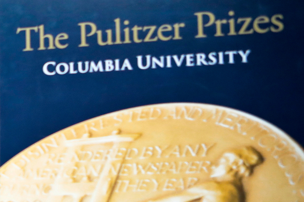 FILE - Signage for The Pulitzer Prizes appear at Columbia University, May 28, 2019, in New York. (AP Photo/Bebeto Matthews, File)