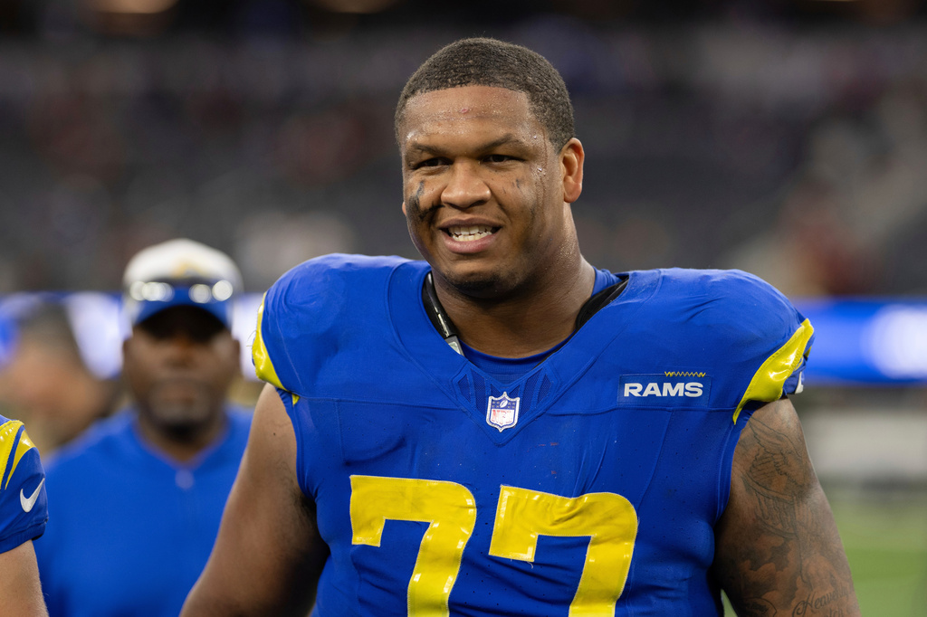 FILE - Los Angeles Rams offensive tackle Alaric Jackson (77) walks back to the locker room after an NFL football game against the Washington Commanders, Dec. 17, 2023, in Inglewood, Calif. (AP Photo/Kyusung Gong, File)
