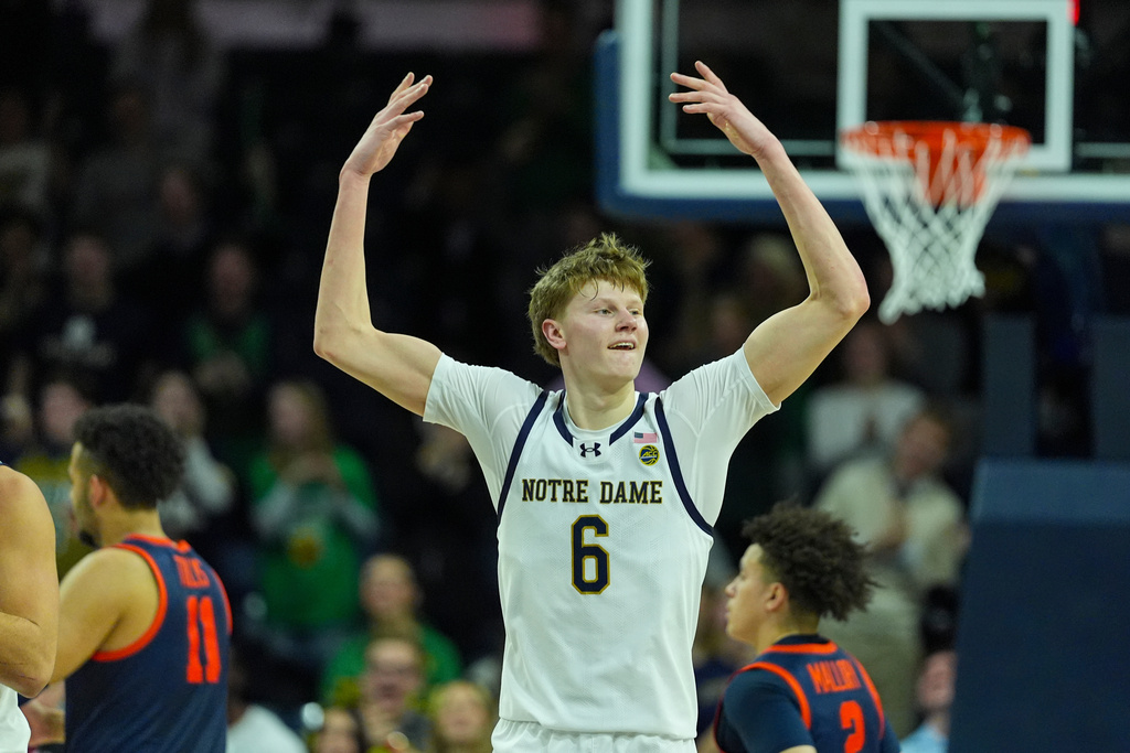 Notre Dame forward Brady Koehler (6) celebrates during the second half of an NCAA college basketball game against Virginia in South Bend, Ind., Tuesday, Jan. 27, 2026. (AP Photo/Michael Conroy)
