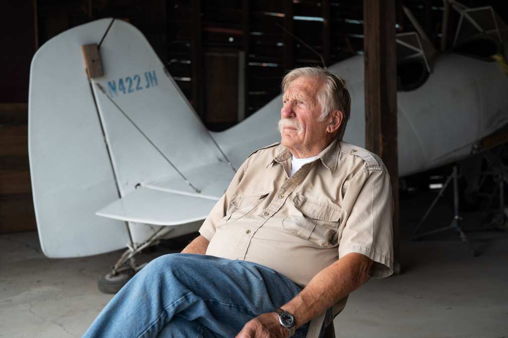 In this Aug. 2025 photo provided by James Wilson, Ken Jouppi sits in a hanger at the Shoshone County Airport in Shoshone County, Idaho. (James Wilson via AP)