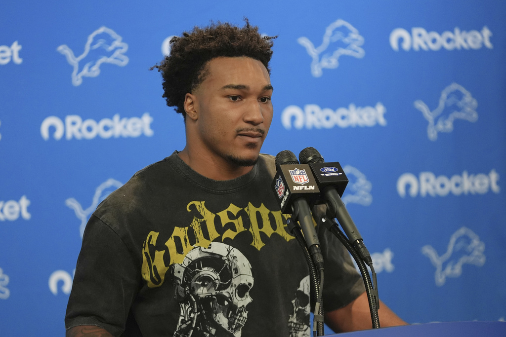 Detroit Lions safety Brian Branch talks to the media following an NFL football game against the Chicago Bears in Detroit, Sunday, Sept. 14, 2025. (AP Photo/Paul Sancya)