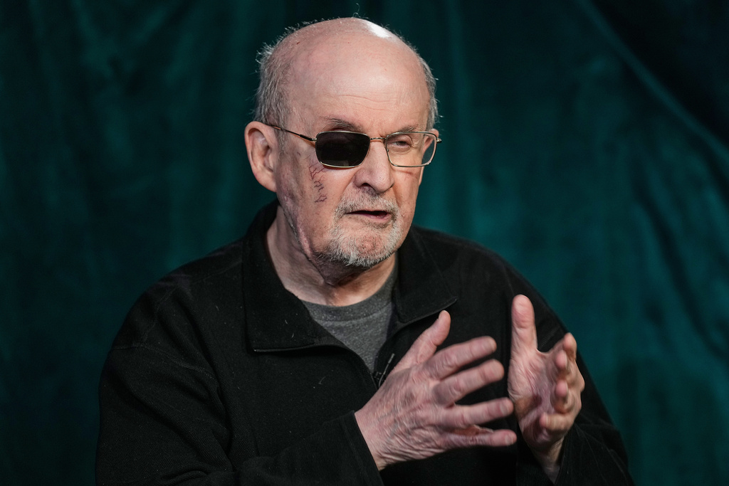 Author Salman Rushdie appears during an interview in New York on Wednesday, Oct. 29, 2025. (AP Photo/Richard Drew)
