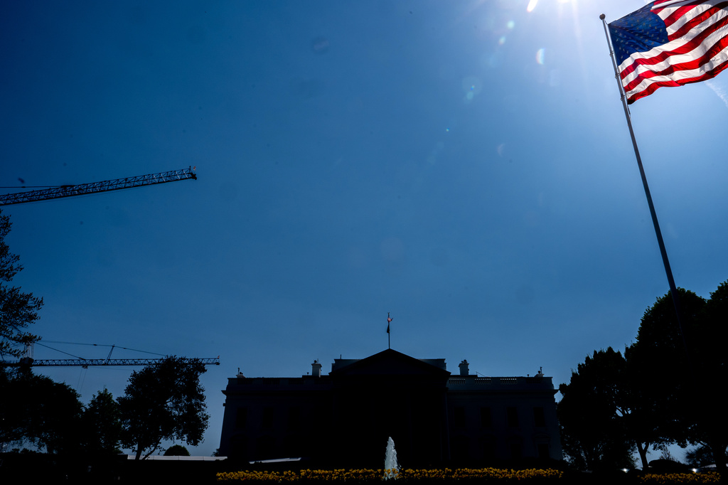 Cranes being used to construct the new White House ballroom are seen around the White House, Saturday, April 4, 2026, in Washington. (AP Photo/Julia Demaree Nikhinson)