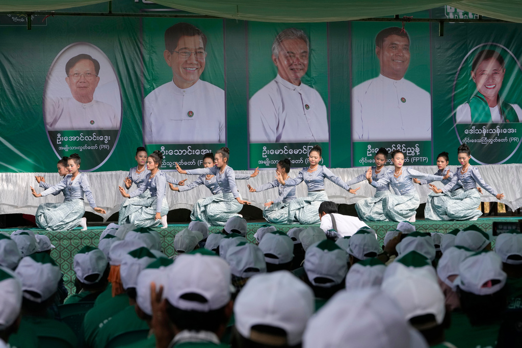 Supporters of the military-backed Union Solidarity and Development Party (USDP) sing songs during election campaign in Pyawbwe Township, Mandalay Division, central Myanmar, Thursday, Dec. 25, 2025. (AP Photo/Aung Shine Oo)